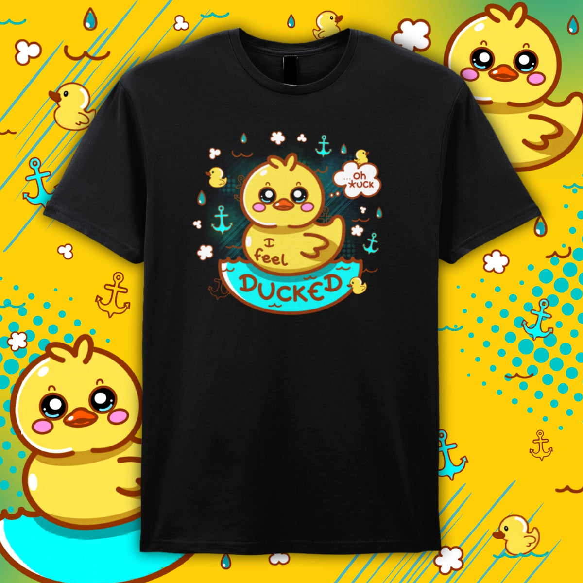 Black Innabox “I Feel Ducked” T-shirt featuring a cute yellow duck illustration with teal and orange accents. The duck sits in water with anchors and bubbles, with playful text including “I feel ducked” and a speech bubble reading “oh *uck”. Disability inspired clothing designed to uplift those with chronic illness and hidden disabilities.