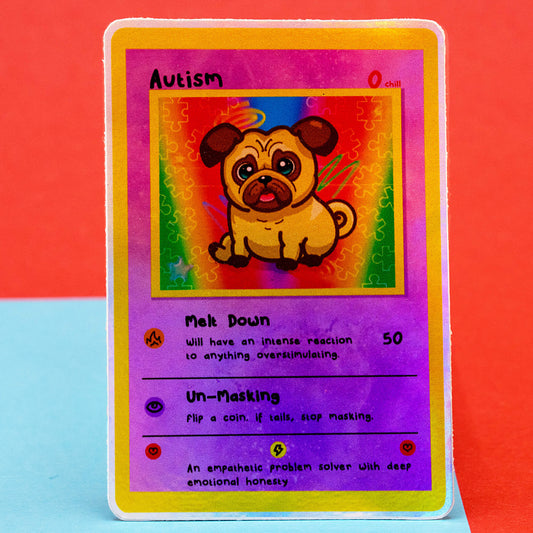 A clear product photo of the Innabox Neurodivergent Collectable Trading Card Sticker – Autism, showing the illustrated pug character on a colourful puzzle-piece background. The card lists traits such as Melt Down and Un-Masking. Shot on a bright red and blue background, ideal for fans of uplifting, disability-inspired stationery and neurodivergent collectables.