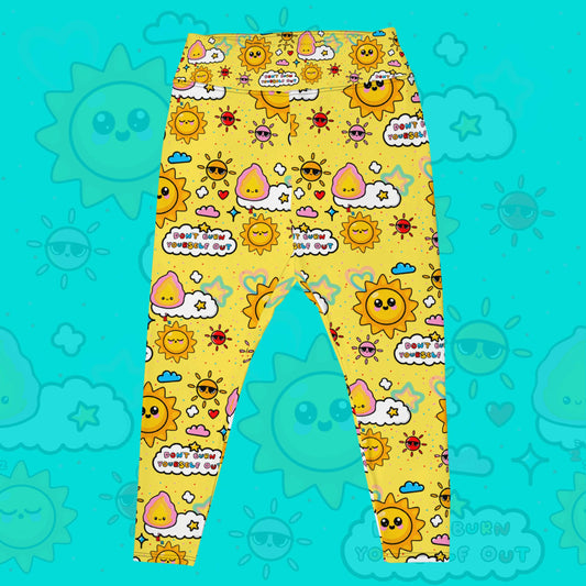 The Don't Burn Yourself Out Plus Size Leggings on an aqua blue background with a faded don't burn yourself print overlayed. The print is yellow with various kawaii face sunshines, sparkles, hearts, pink flames and pink, blue and white clouds with don't burn yourself out inside in rainbow. Design inspired by the self care movement.