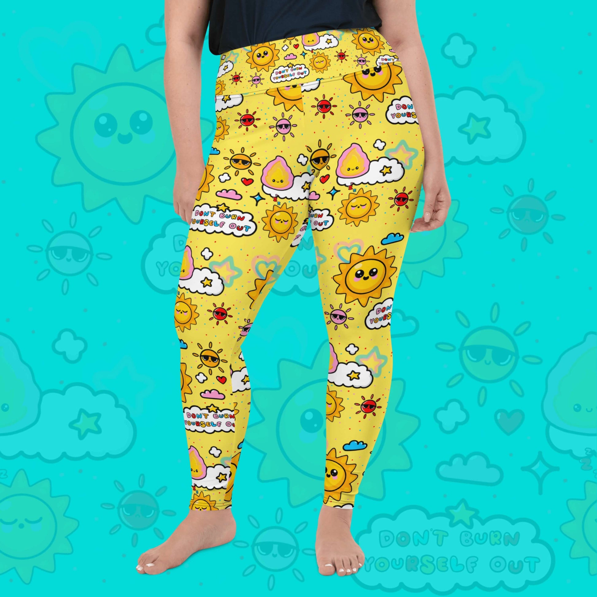 The Don't Burn Yourself Out Plus Size Leggings on a model over an aqua blue background with a faded don't burn yourself print overlayed. The model is facing forward with their left leg out to the side and both hands resting by their side, the photo is cropped from the waist down. The print is yellow with various kawaii face sunshines, sparkles, hearts, pink flames and pink, blue and white clouds with don't burn yourself out inside in rainbow. Design inspired by the self care movement.