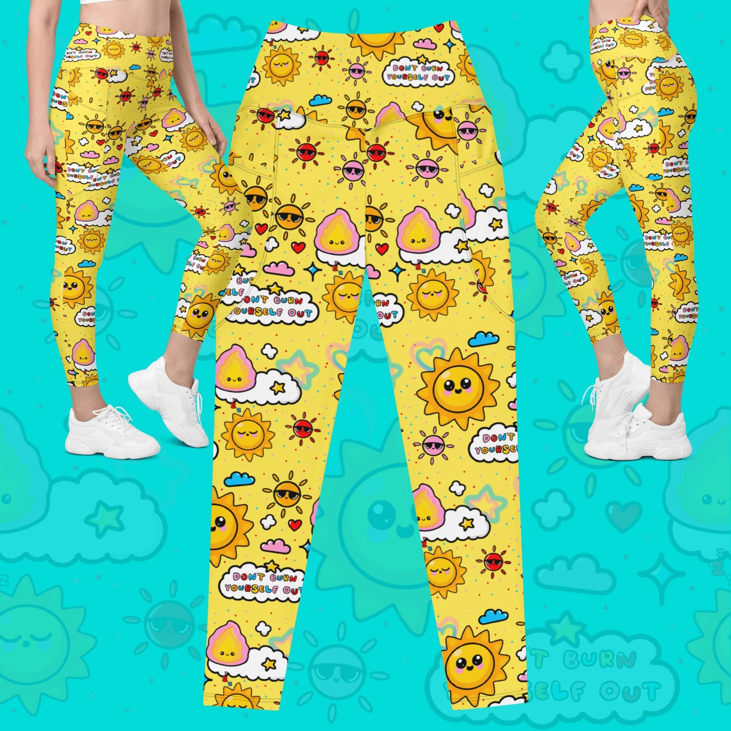 The Don't Burn Yourself Out Leggings with pockets on an aqua blue background with a faded don't burn yourself print overlayed with two models facing inwards on either top corners. The print is yellow with various kawaii face sunshines, sparkles, hearts, pink flames and pink, blue and white clouds with don't burn yourself out inside in rainbow. Design inspired by the self care movement.