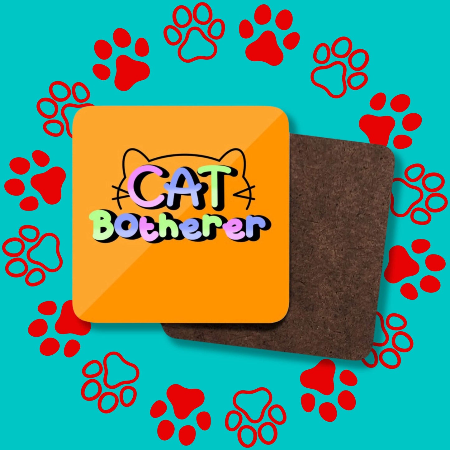 A collage of the Cat Botherer Coaster facing forward and backwards to show the plain wooden back on a red and blue paw print background. The orange wooden coaster has rounded edges and pastel rainbow text reading 'cat botherer' and a black cat head outline.