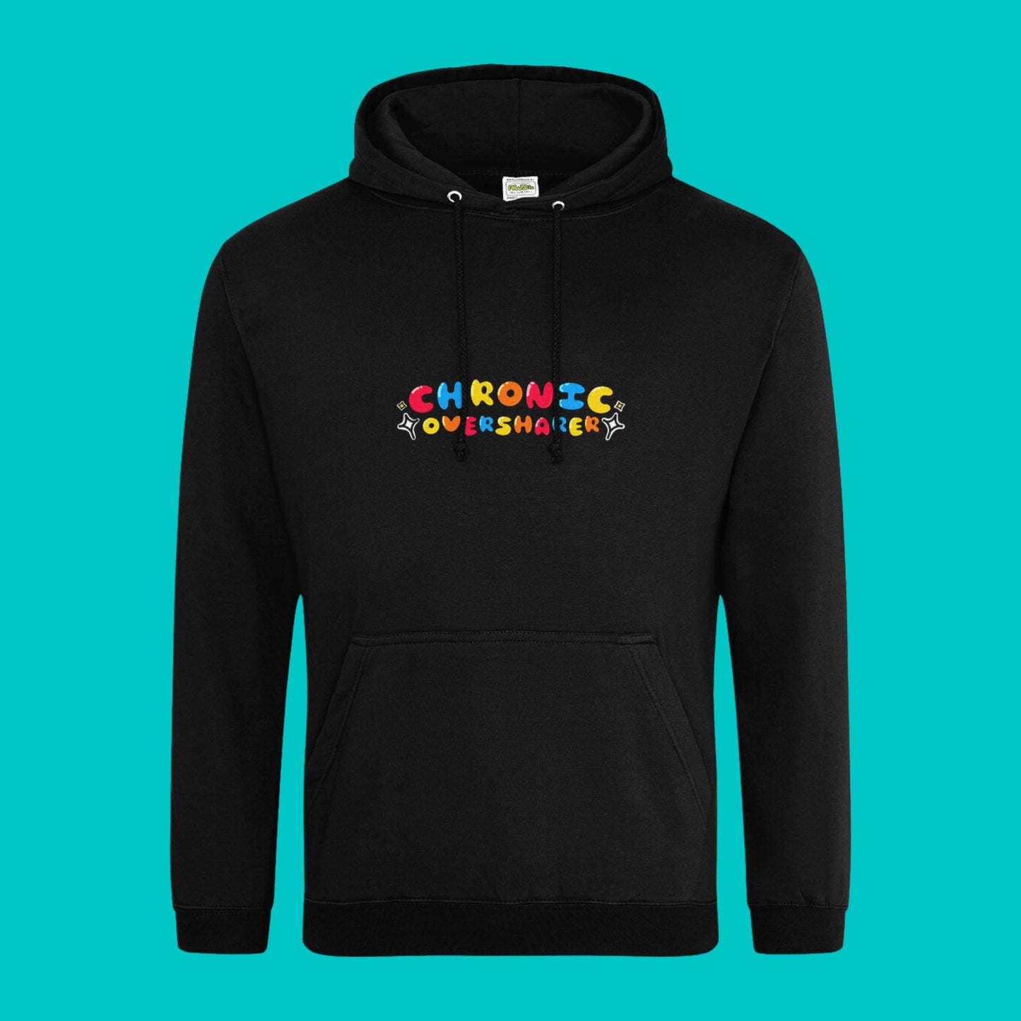 The Chronic Over Sharer Black Hoodie shown on a blue background. The black hoodie features a drawstring hood, a large front pocket and the text 'chronic oversharer' in rainbow bubble font with a black shadow effect and white sparkles. The design was created to raise awareness for neurodivergent disorders such as ADHD.