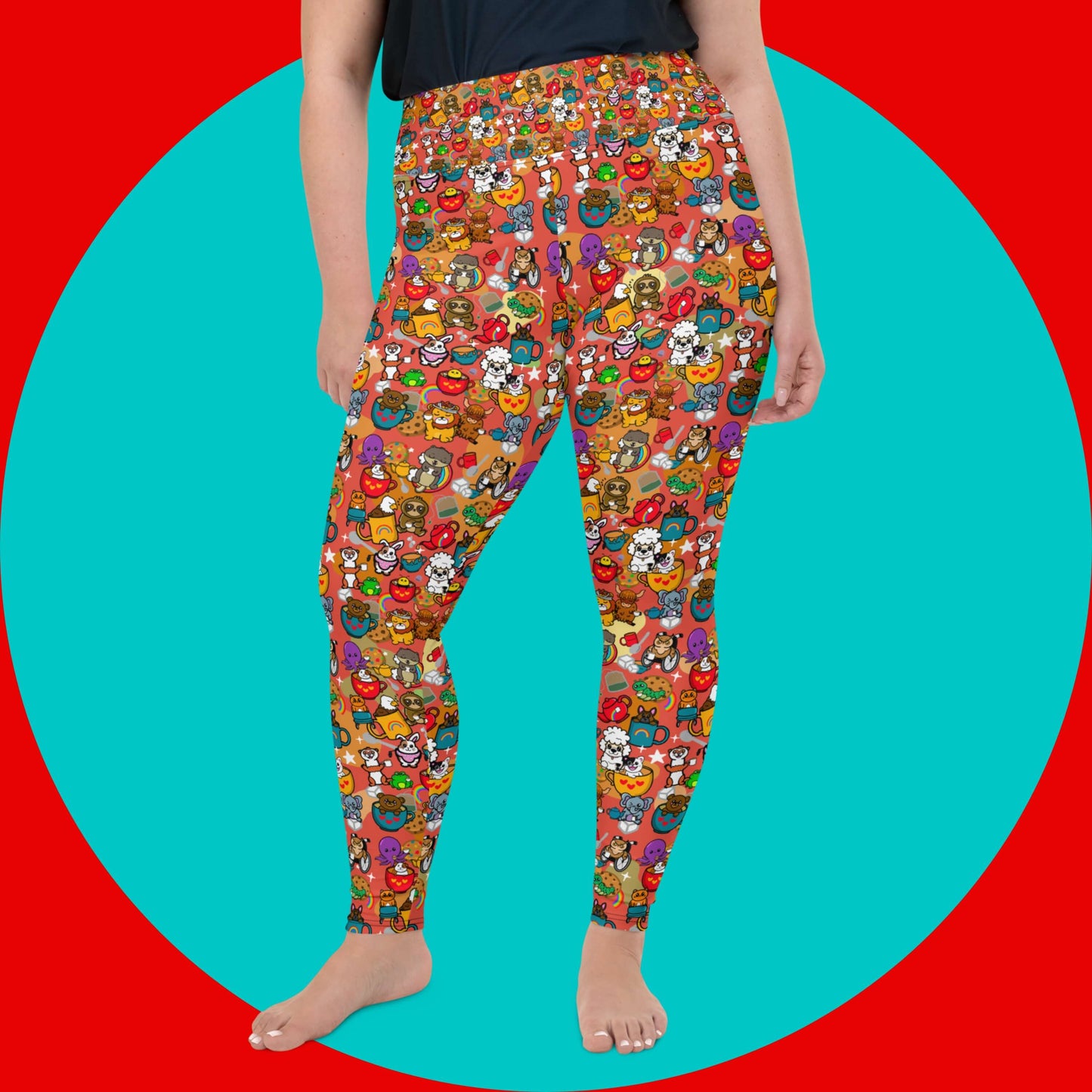 The Disabili Tea and Biscuits - Disability Plus Size Leggings being modelled by a femme person wearing a black tee on a red and blue background. The leggings feature various disabled and chronically ill animal characters drinking tea, sitting in tea mugs and holding up mugs. There is also various cookie biscuits, tea bags, sugar cubes, teapots, rainbows, sparkles and tea spills all underneath. The leggings are a punny gift raising awareness for disabilities.