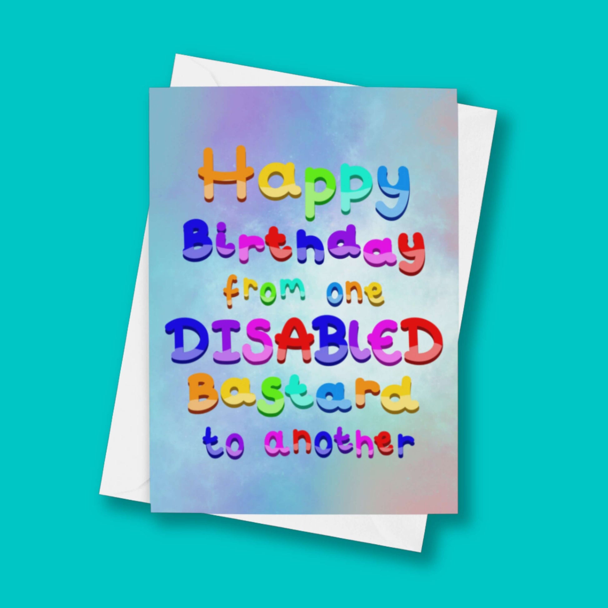 The Happy Birthday From One Disabled Bastard To Another Card on a  blue background with a white envelope underneath. The pastel blue and purple a6 birthday card has rainbow bubble writing reading 'happy birthday from one disabled bastard to another'. The hand drawn design is a humorous greeting card raising awareness for disabled people.