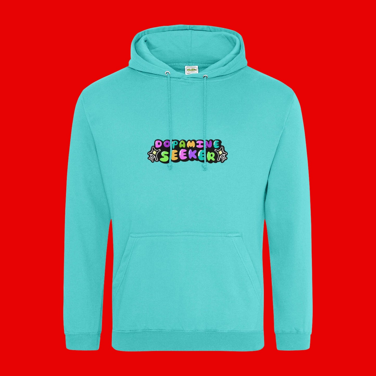The Dopamine Seeker Hoodie in turquoise surf on a red background. The hoodie design has 'dopamine seeker' written in the middle in rainbow bubble font and black sparkle outlines. The hoodie has pastel teal drawstrings and a large centre pocket. Design is raising awareness for ADHD and neurodivergence.