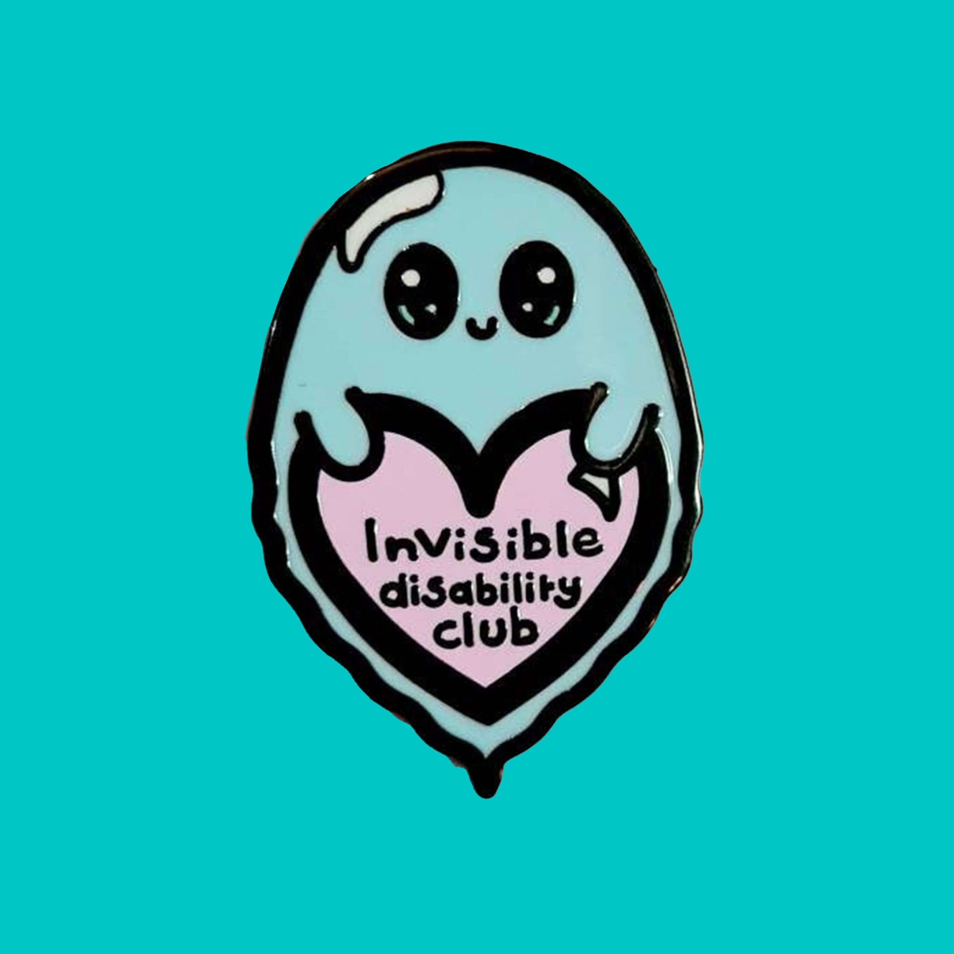 Invisible Disability Club Enamel Pin shown on a blue background. The enamel pin is of a cute smiling ghost holding a pink heart with text saying invisible disability club. The enamel pin is designed to raise awareness for hidden and chronic disabilities