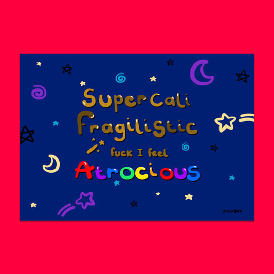 The I Feel Atrocious Postcard on a red background. A dark blue postcard with black, white, purple and blue stars, moons and swirls dotted around it. 'Supercali fragilistic fuck I feel' is written in big gold letters with 'Atrocious' written in rainbow coloured letters underneath it.