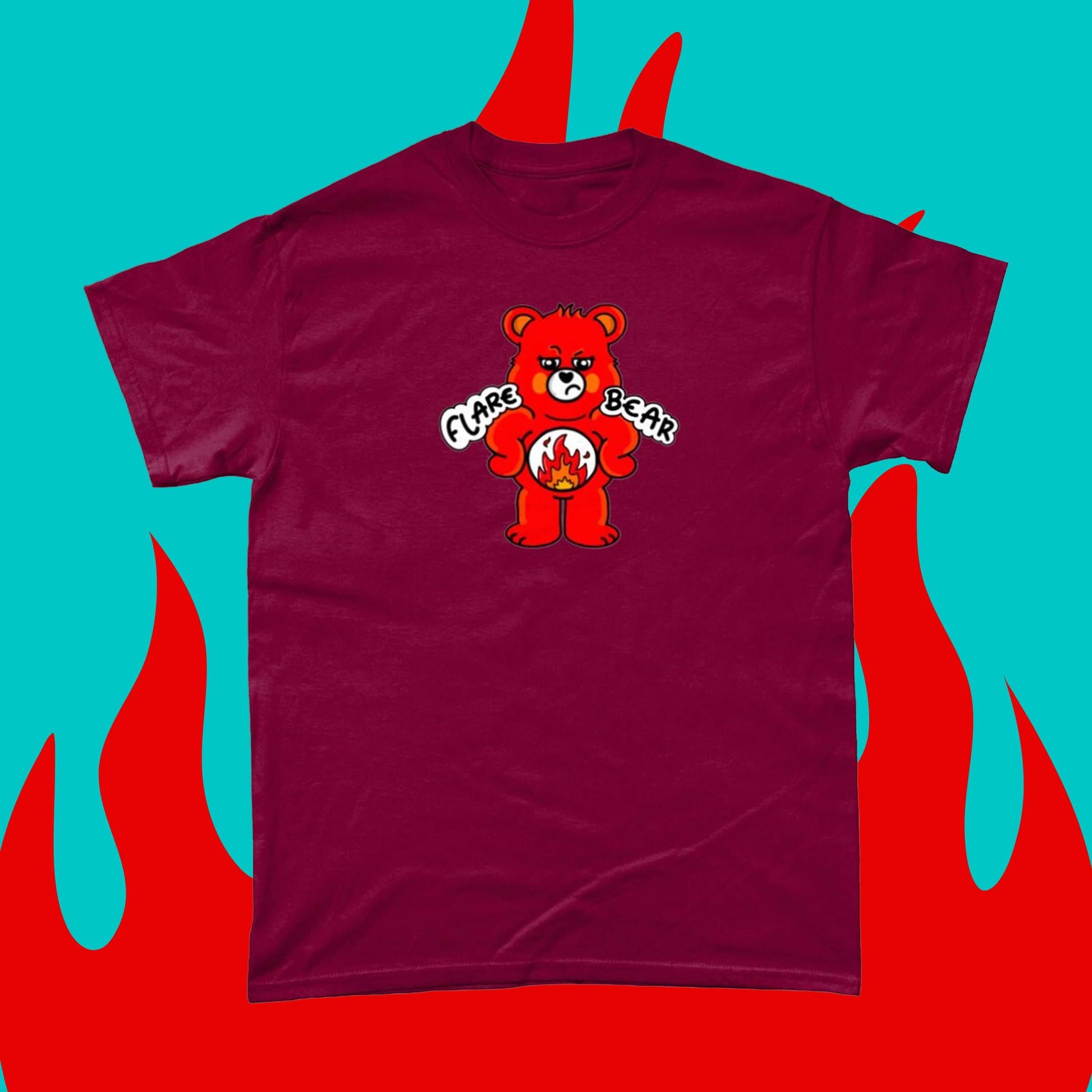 Flare Bear T-shirt on a blue and red flame background. The cardinal red short sleeve tshirt is of a red bear with a fed up expression and hands on its hips. There is a white circle on its belly with flames inside. Flare Bear is written on the middle. The tshirt is designed to raise awareness for chronic illness flare ups.