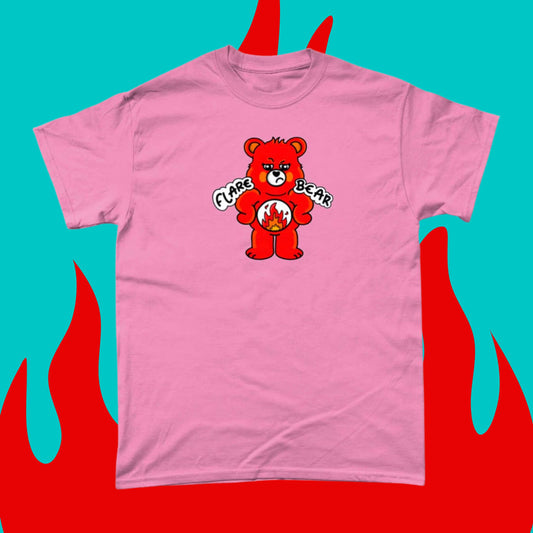 Flare Bear T-shirt on a blue and red flame background. The azalea pink short sleeve tshirt is of a red bear with a fed up expression and hands on its hips. There is a white circle on its belly with flames inside. Flare Bear is written on the middle. The tshirt is designed to raise awareness for chronic illness flare ups.