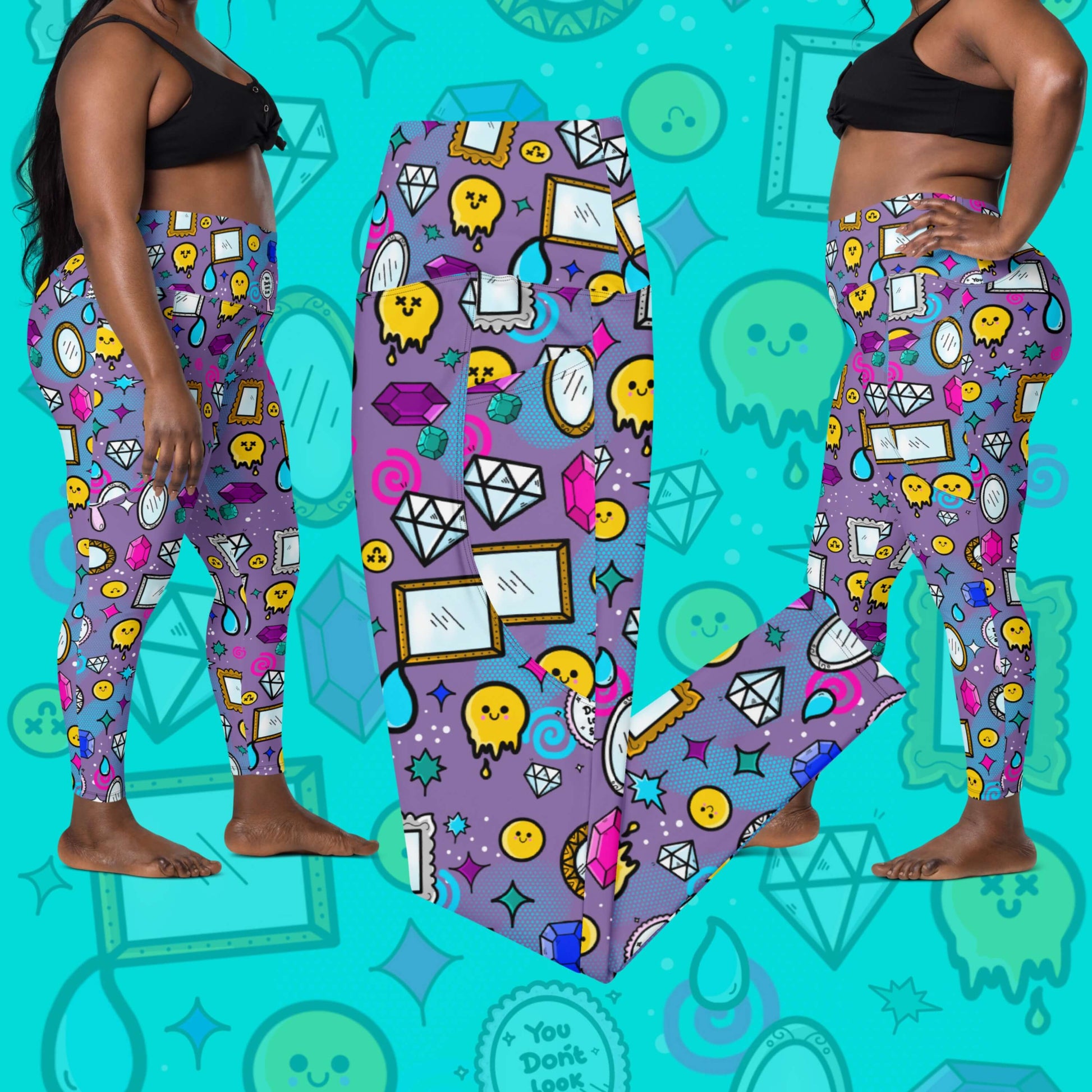 The You Don't Look Sick Leggings with pockets laying on a blue background with a faded version of the print, on either side is a femme model facing towards the middle wearing a black crop top and the leggings. The purple base leggings features melting yellow smiley faces, mirrors, gemstones, teardrops, sparkles, swirls and dots with a centre hand held mirror reading 'you don't look sick'. The hand drawn design is raising awareness for invisible illnesses.