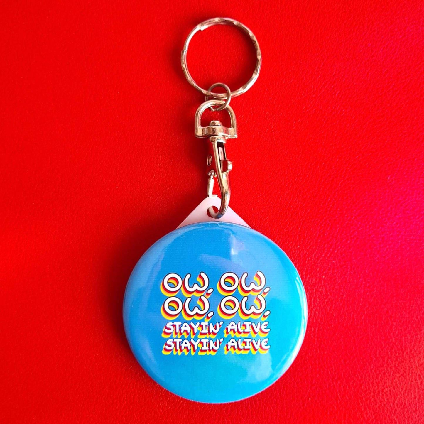 Ow, Ow, Ow, Ow, Staying Alive Keyring