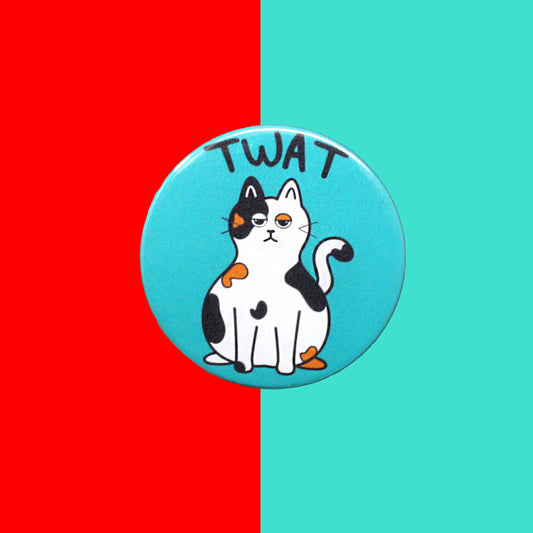 A badge with an annoyed looking tabby cat on a light blue background with the word TWAT above it. The background the badge is on is red and blue.