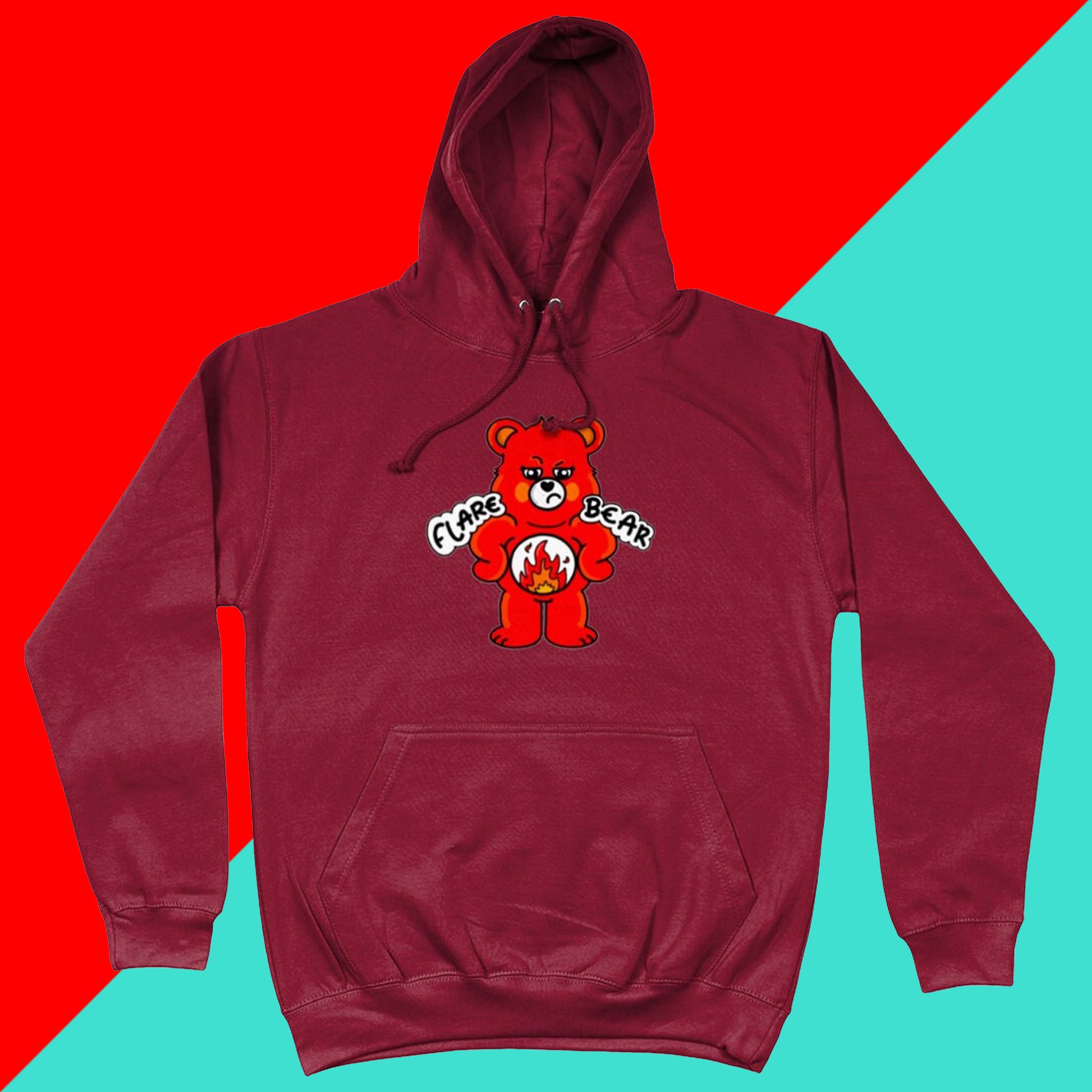 Flare Bear hoodie jumper in red hot chilli shown on a red and blue background. The hoodie is of a red bear with a fed up expression and hands on its hips. There is a white circle on its belly with flames inside. Flare Bear is written on the hoodie. The hoodie is designed to raise awareness for chronic illness flare ups.