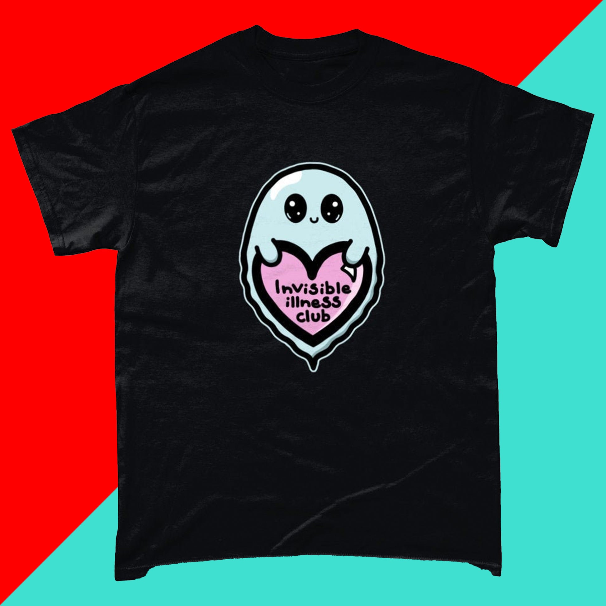The Invisible Illness Club Black Tee on a blue and red background. The black short sleeve tshirt has a pastel blue smiling ghost with big sparkly eyes holding up a pastel pink heart with black text reading 'invisible illness club'. The hand drawn design is raising awareness for hidden disabilities. 