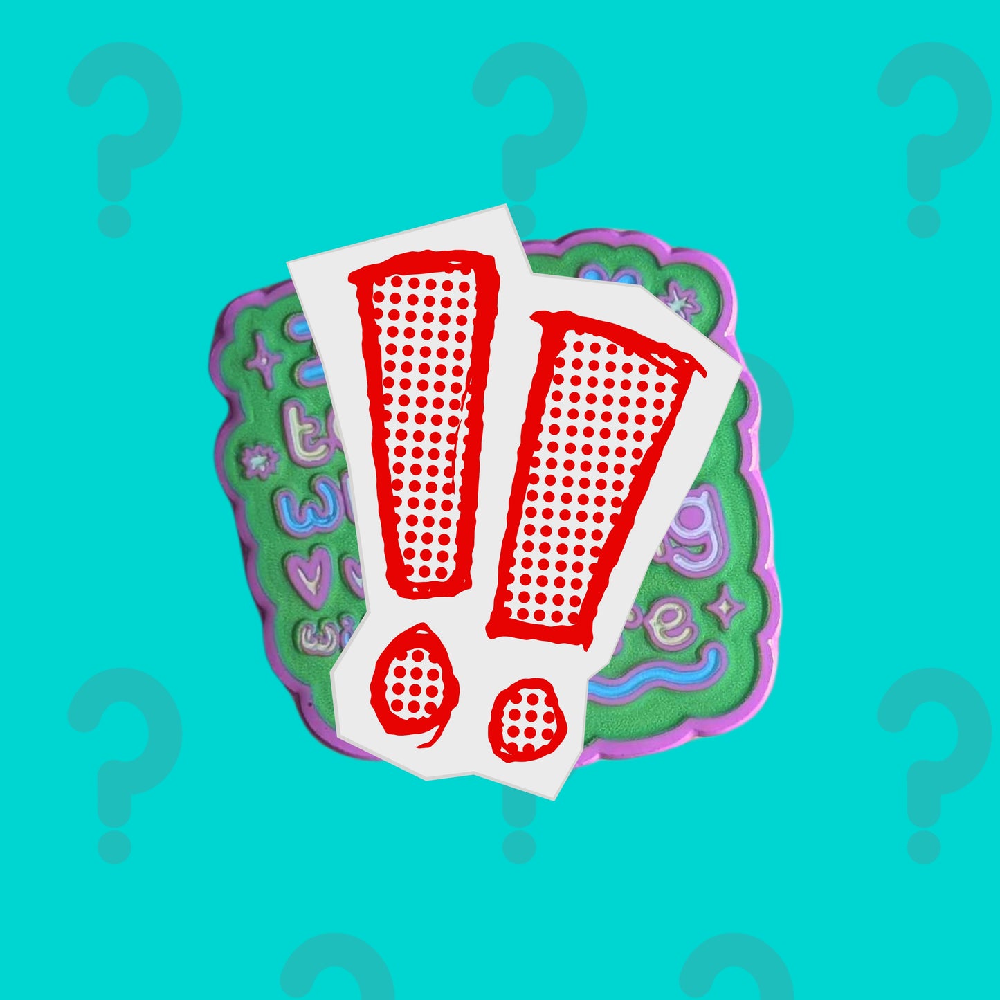 Teaser image for Innabox March Theme Exclusive Mystery Enamel Pin Subscription featuring a colourful enamel pin partially hidden behind bold exclamation marks on a teal background with question marks. Disability inspired pin subscription designed to uplift people with chronic illness and hidden disabilities.