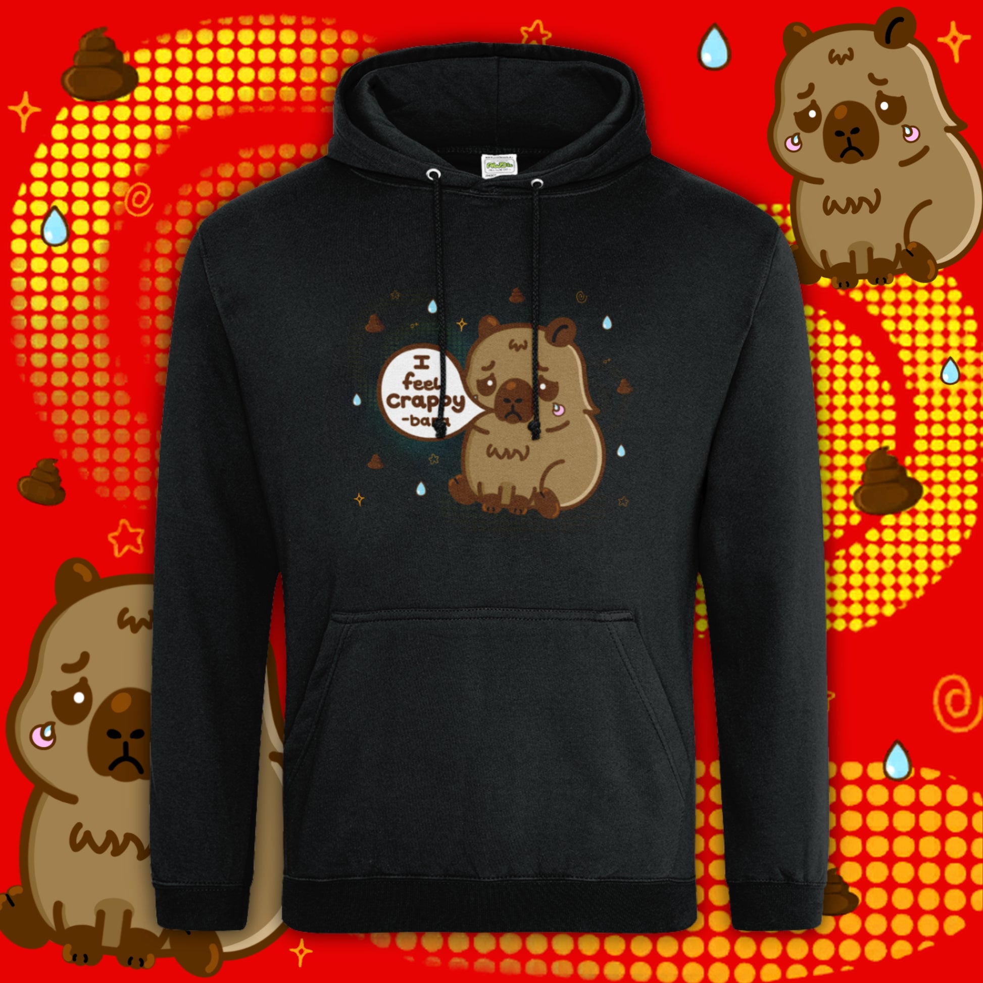 Black hoodie featuring a sad cartoon capybara holding a speech bubble reading “I feel crappy-bara”, surrounded by small tear drops and doodles on a red patterned background. Cute mental health inspired design by Innabox, a disability positive brand creating uplifting products for chronic illness and hidden disabilities.