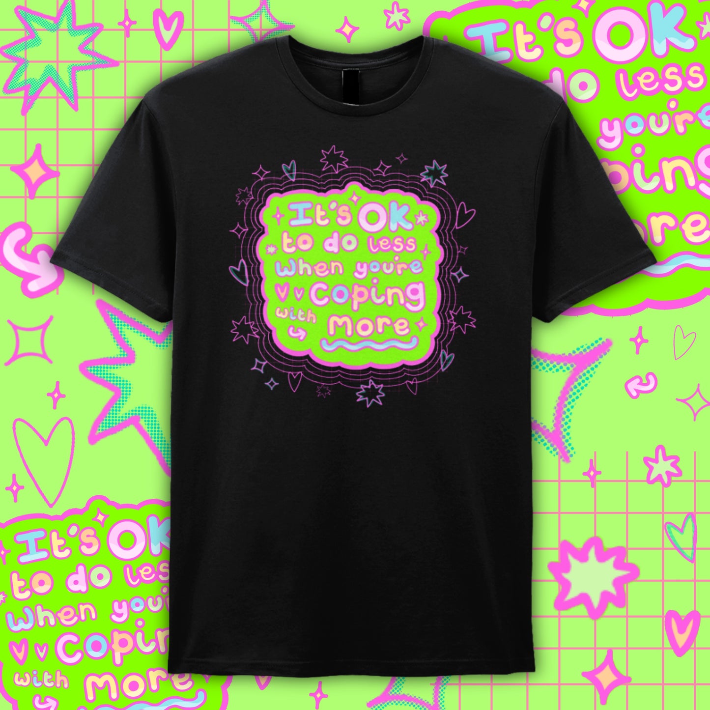 Black Innabox t-shirt featuring a bright neon green and pink graphic with the text “It’s OK to do less when you’re coping with more”. Surrounded by playful stars, hearts and doodles, this disability-positive design promotes mental health awareness and self-compassion for people with chronic illness and hidden disabilities.