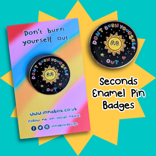 SECONDS Don’t Burn Yourself Out Sunshine Enamel Pin by Innabox displayed on a rainbow gradient backing card. Black circular enamel pin featuring a cute smiling yellow sun with colourful lettering and tiny stars and hearts. Disability inspired motivational badge designed to uplift people with chronic illness and hidden disabilities. Imperfect second pins with slightly off circle design.