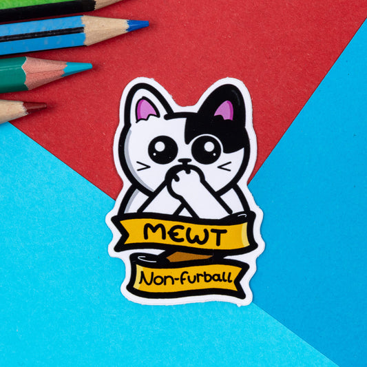 The Mewt Non Furrball Cat Sticker - Mute Non Verbal on a red and blue background with colouring pencils. The black and white cat sticker is covering its mouth with its paws with a yellow banner underneath reading 'Mewt' 'Non-furball'. The hand drawn design is raising awareness for mute and non verbal symptoms.
