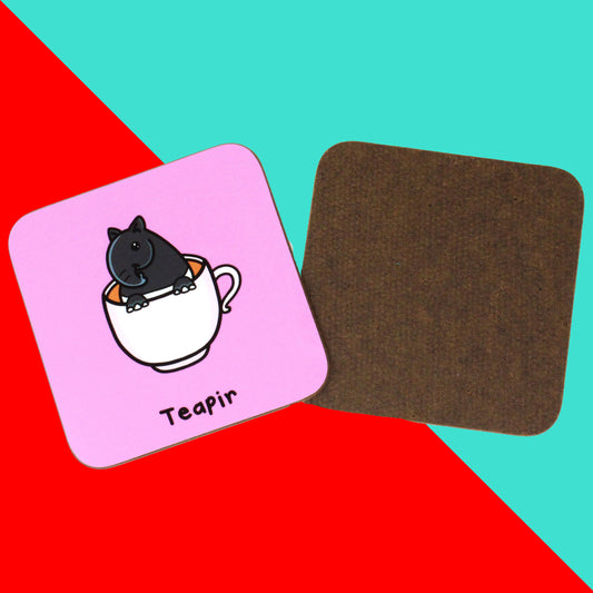 Teapir Coaster - Tapir shown on a red and blue background. The pink wooden coaster has an illustration of a  cute grey tapir inside a white teacup with the word 'teapir' underneath in black text. 