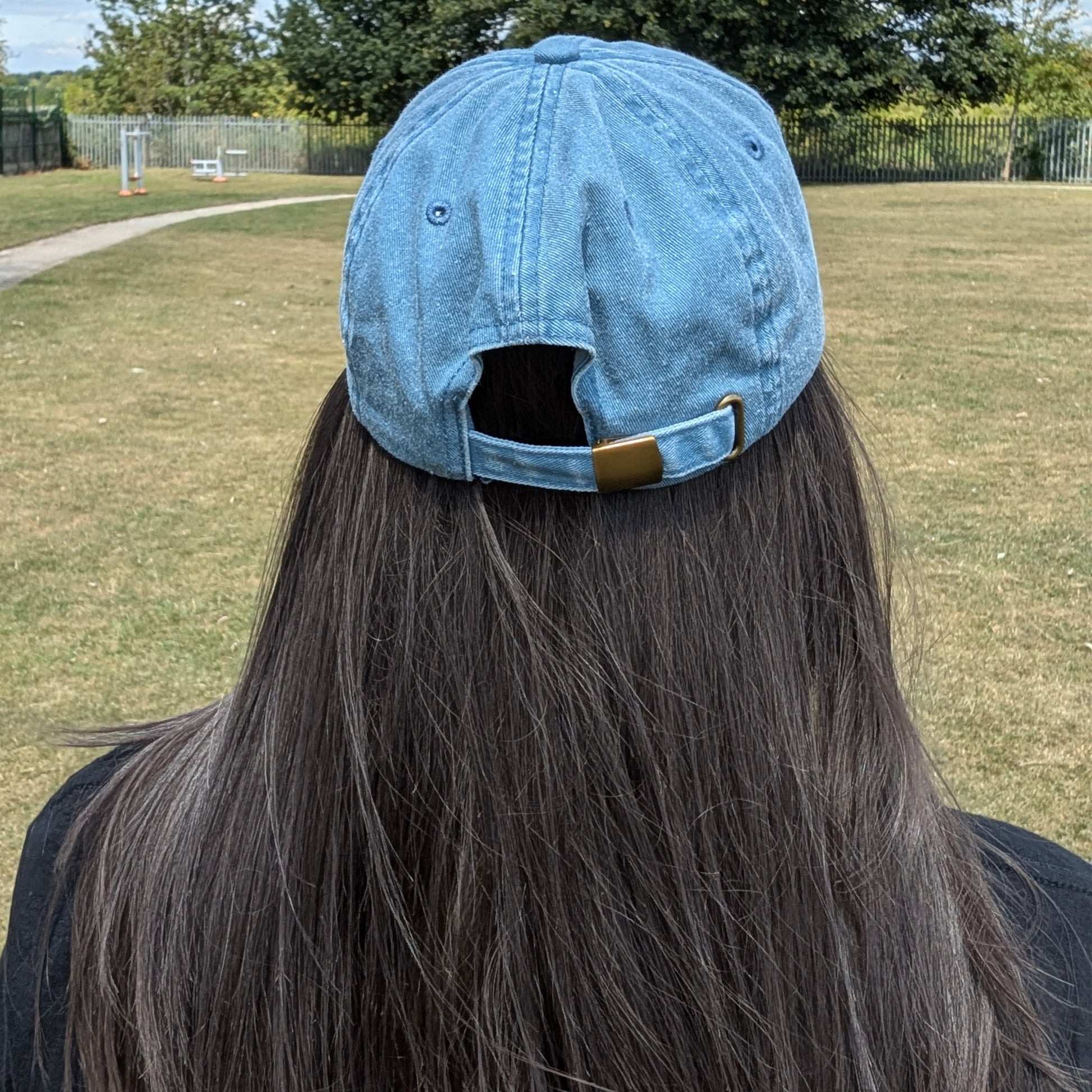 Back of Innabox’s Overwhalemed cap in soft vintage denim, showing strap and stitching detail. A relaxed, comfy fit for everyday wear.